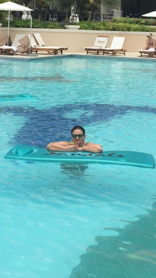 Sandy Holton relaxing at a Sandals resort